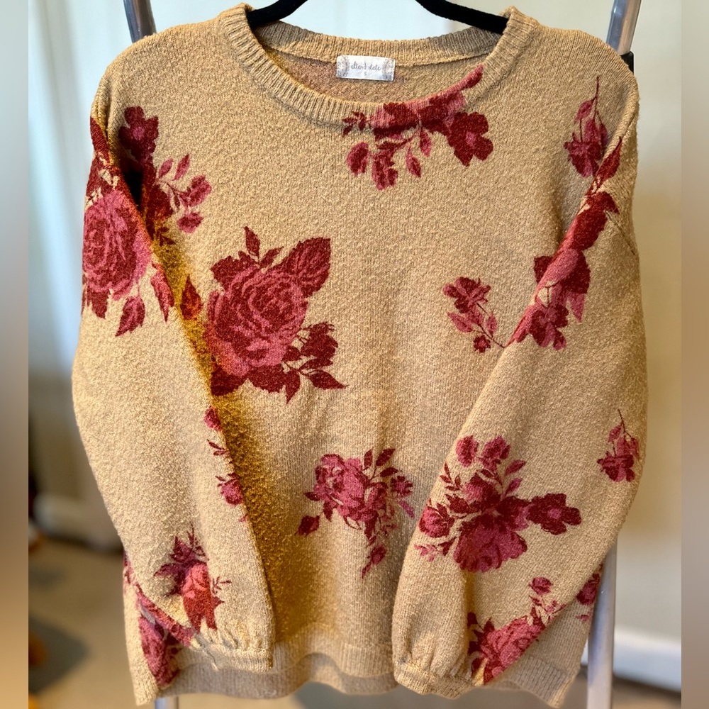 Beautiful tan sweater with roses. Very pretty!!